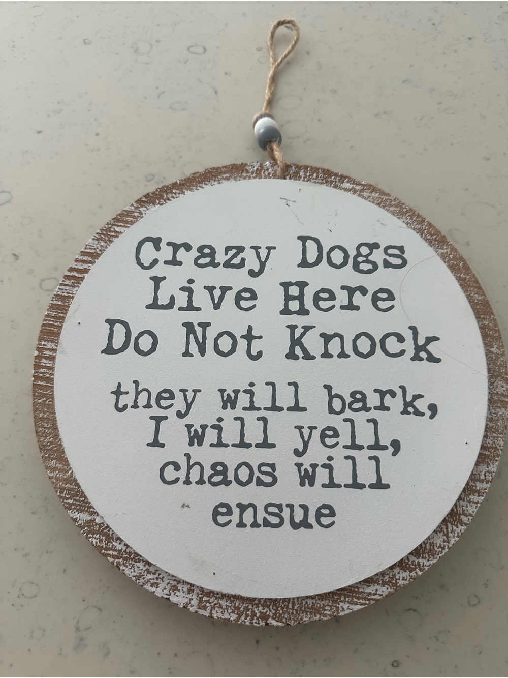 Hobby Lobby White and Brown 'Crazy Dogs Live Here' Round Wood Sign